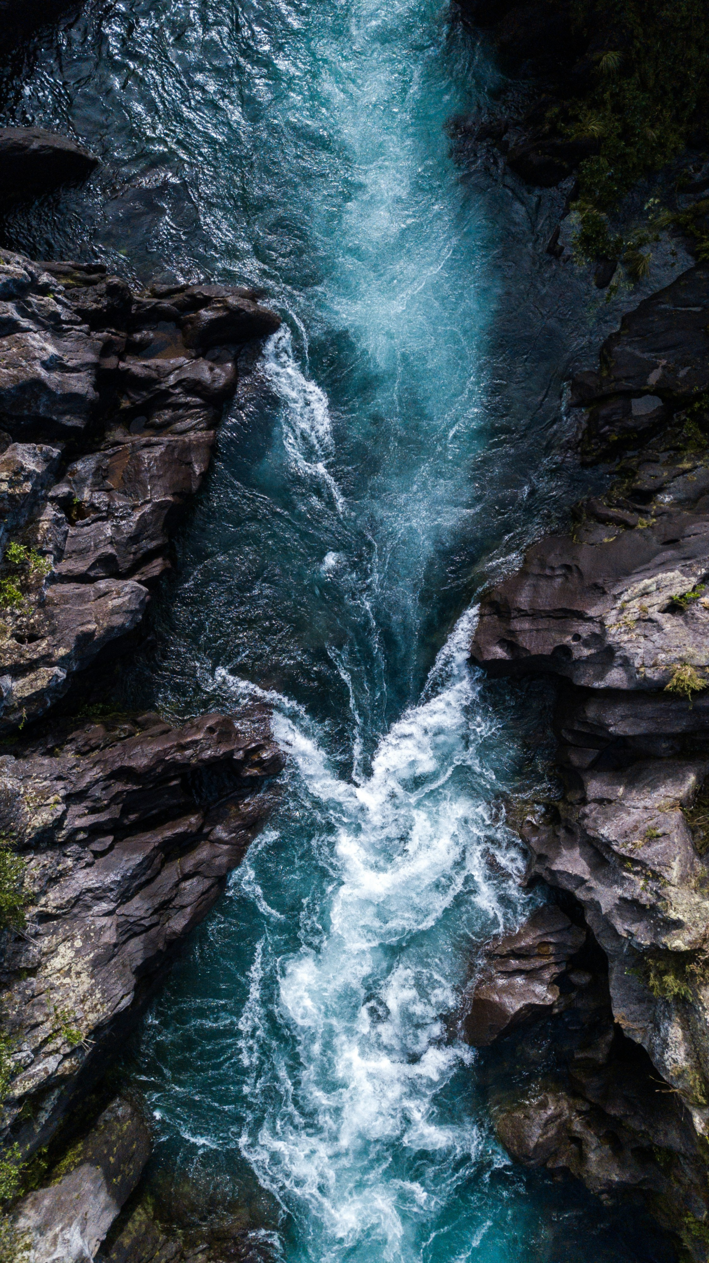large river surrounded by rocks